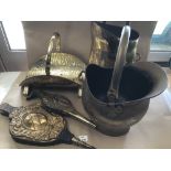 A GROUP OF BRASS ITEMS INCLUDING HELMET SHAPE BUCKET AND LOG BASKET