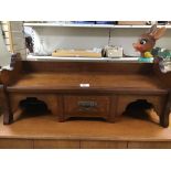 A VINTAGE WOODEN SHELF UNIT WITH A CENTER DRAW AND INLAY