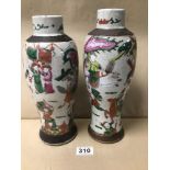A PAIR OF JAPANESE GLAZED CERAMIC VASES DECORATED WITH TRADITIONAL BATTLE SCENES, 30CM HIGH