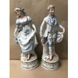 A PAIR OF LARGE CONTINENTAL BISQUE FIGURES OF A LADY AND GENTLEMAN, 43CM HIGH