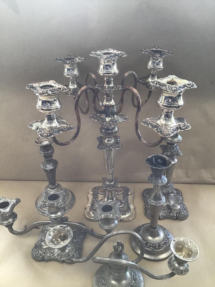 A GROUP OF SILVER PLATED CANDELABRAS AND CANDLESTICKS - Image 2 of 3