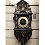 A VINTAGE BELL WALL CLOCK WITH PENDULUM AND WEIGHTS