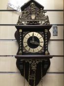 A VINTAGE BELL WALL CLOCK WITH PENDULUM AND WEIGHTS