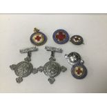 A GROUP OF ST JOHN AMBULANCE ASSOCIATION & RED CROSS MEDALS AND BADGES, SOME WITH ENAMEL DETAILING