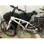 AN URBAN PACIFIC FOLDING BICYCLE.