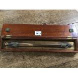 A PLOTTING RULE BY E.R. WATTS AND SONS LONDON IN ORIGINAL WOODEN CASE.