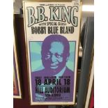 A FRAMED AND GLAZED B.B. KING POSTER 27 X 57CM