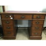 A LATE 19TH CENTURY MAHOGANY DESK WITH RED LEATHER