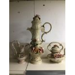 AN UNUSUALLY LARGE CAPODIMONTE COFFEE POT, 65CM HIGH, TOGETHER WITH A TEAPOT AND A MILK JUG