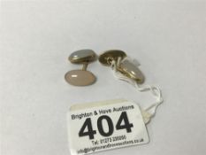 A PAIR OF 14CT GOLD CUFFLINKS, EACH SET WITH TWO CABOCHON MOON STONES, 8.7G
