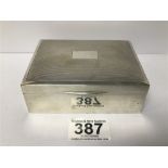 A SILVER CIGARETTE BOX OF RECTANGULAR FORM WITH ENGINE TURNED DECORATION TO TOP, BAKELITE BASE,