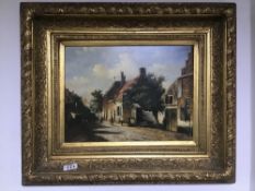 A FRAMED OIL ON BOARD OF A CONTINENTAL SCENE SIGNED BUCKHOUT 29 X 39 CM