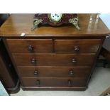 A VICTORIAN MAHOGANY TWO OVER THREE CHEST OF DRAWERS