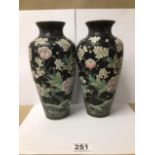 A PAIR OF JAPANESE CLOISONNE ENAMEL VASES, FLORAL SCENES ON A BLACK GROUND, 24CM HIGH (ONE A/F)