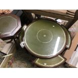 TWO MAHOGANY PIECES OF FURNITURE INCLUDING DRUM TABLE. BOTH WITH GREEN LEATHER TOPS.