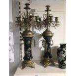 A LARGE PAIR OF LATE 19TH CENTURY BRASS CANDLEABRA, FIVE SCONCE, THE CYLINDRICAL CENTER SECTION