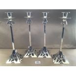 FOUR STYLISED CHROME CANDLESTICKS 35CM