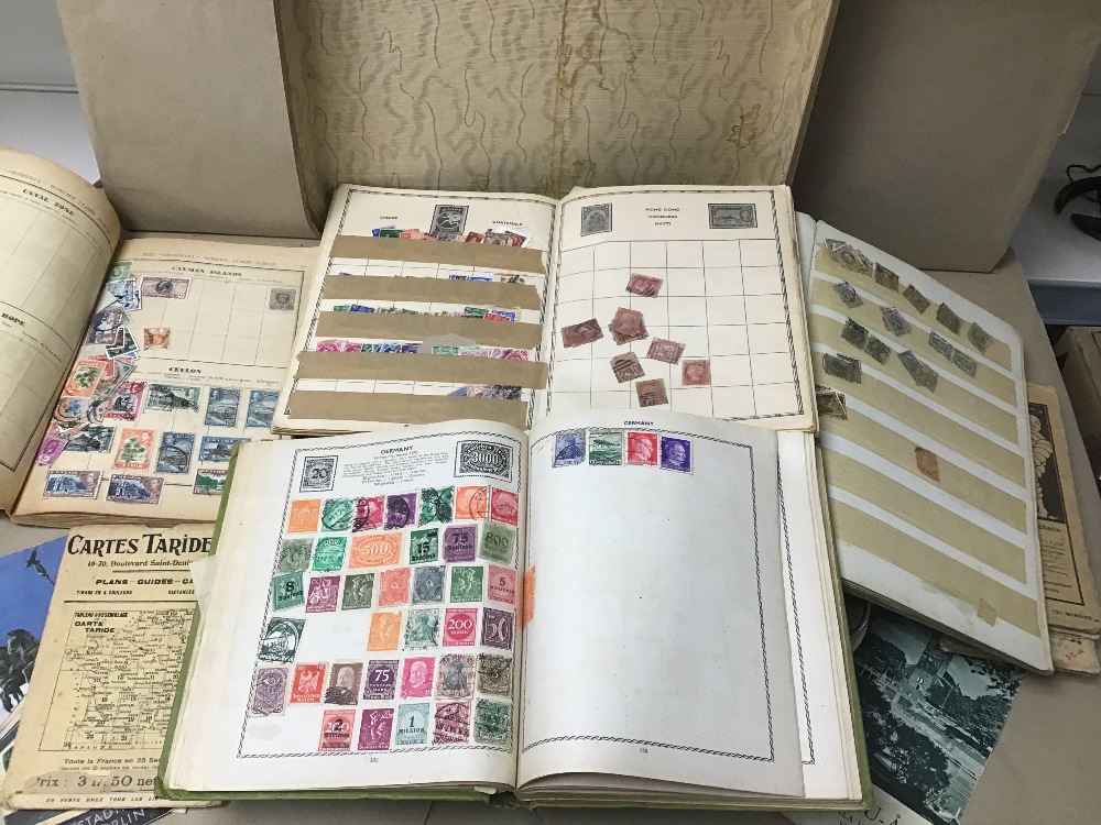 A VINTAGE ARABIAN GULF AGENCIES FLIGHT CASE WITH A LARGE COLLECTION OF STAMP ALBUMS AND LOOSE ONES