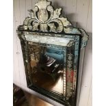 A VINTAGE VENETIAN MIRROR 81 X 110 CM