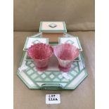 AN ART DECO SET OF CATALIN AND LUCITE DRESSING TABLE SET WITH TWO PINK BAKELITE FLUTES