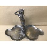 AN ART NOUVEAU METAL TWO SIDED DISH WITH STYLISED FEMALE FIGURE TO CENTER, 21CM HIGH