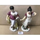 A PAIR OF ROCKINGHAM FIGURES 20 CM