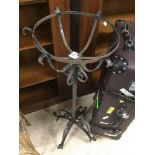 A WROUGHT IRON PLANT STAND 90 CM