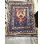 A TURKISH HANDWOVEN CARPET / RUG 145 X 101 CM