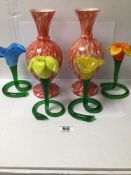 SIX VINTAGE COLOURED GLASS VASES OF WHICH FOUR ARE FLOWER SHAPED