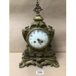 A 19TH CENTURY ORMOLU MANTLE CLOCK IN THE ROCOCO STYLE, THE ENAMEL DIAL WITH ARABIC NUMERALS