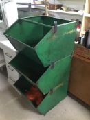 A GREEN METAL PRODUCE THREE TIER CONTAINER