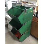 A GREEN METAL PRODUCE THREE TIER CONTAINER