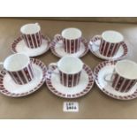 A SET OF SIX SUSIE COOPER COFFEE CUPS "N" SAUCERS 1960S