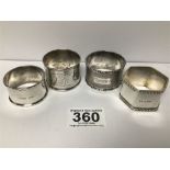A GROUP OF FOUR SILVER NAPKIN RINGS, 82G