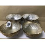 A GROUP OF FOUR CYPRIOT 830 GRADE SILVER BOWLS, EACH RAISED UPON THREE ORNATE FEET, HIGHLY