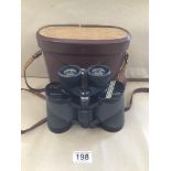 A PAIR OF VINTAGE CASED BINOCULARS BY SWIFT AUDUBON 85 X 44CM