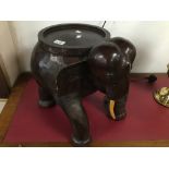 A LARGE CARVED WOODEN ELEPHANT WITH STORAGE 38 CM HIGH