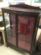 A VINTAGE MAHOGANY GLASS DISPLAY CABINET WITH TWO SHELFS