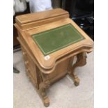 A VINTAGE DAVENPORT DESK WITH GREEN LEATHER