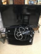 A SONY BRAVIA TV WITH REMOTE AND CONNECTIONS (KDL-40W5810) WITH STAND W/O