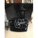 A SONY BRAVIA TV WITH REMOTE AND CONNECTIONS (KDL-40W5810) WITH STAND W/O