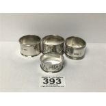 A GROUP OF FOUR MIXED SILVER NAPKIN RINGS, 73G
