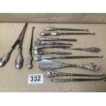 A GROUP OF SILVER HANDLED ITEMS, INCLUDING SHOE HORN, GLOVE STRETCHER, SEWING HOOK AND MORE