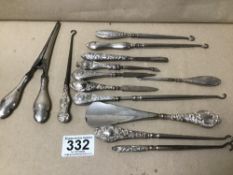 A GROUP OF SILVER HANDLED ITEMS, INCLUDING SHOE HORN, GLOVE STRETCHER, SEWING HOOK AND MORE