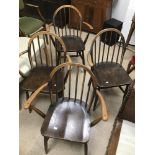 FOUR VINTAGE ERCOL ARM CHAIRS