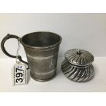 AN AMERICAN WHITE METAL SINGLE HANDLED CUP BY JOHN KITTS AND CO, WITH ENGINE TURNED DECORATION