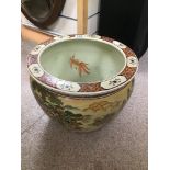 A CHINESE FISHBOWL WITH POLYCHROME DECORATION 37 DIAMETER