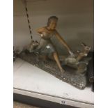 A LARGE ART DECO CHALK FIGURE WITH ANIMALS 68CMS. (A/F)