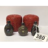 A PAIR OF ORIENTAL CINNABAR LIDDED POTS, TOGETHER WITH THREE UNUSUAL SMALL ORIENTAL PERFUME BOTTLES