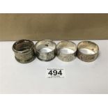 A GROUP OF FOUR SILVER NAPKIN RINGS WITH ENGRAVED FLORAL DECORATION, 77G